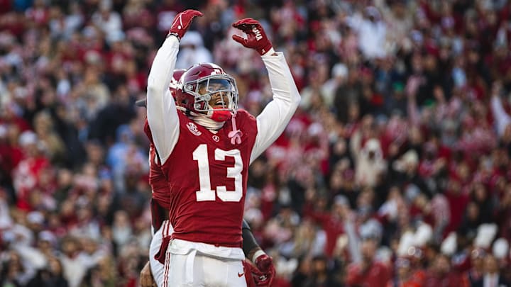 Nov 30, 2024; Tuscaloosa, Alabama, USA; Alabama Crimson Tide defensive back Malachi Moore (13) celebrates after a play against the Auburn Tigers during the second quarter at Bryant-Denny Stadium. Mandatory Credit: Will McLelland-Imagn Images
