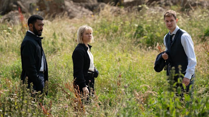 KAREN PIRIE SERIES 2
ITV

Pictured (L-R): ZACH WYATT as Phil Parhatka, LAUREN LYLE as Karen Pirie and CHRIS JENKS as DC Jason Murray.

This image is under copyright and can only be reproduced for editorial purposes in your print or online publication. This image cannot be syndicated to any other third party.
Copyright ITV