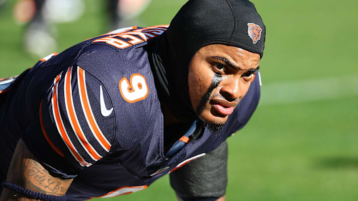 Nov 23, 2025; Chicago, Illinois, USA; Chicago Bears safety Jaquan Brisker (9) stretches before the game against the Pittsburgh Steelers at Soldier Field.