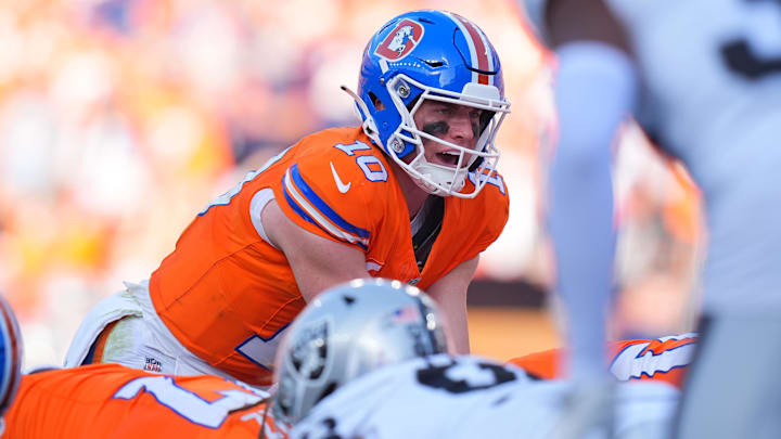 Oct 6, 2024; Denver, Colorado, USA; Denver Broncos quarterback Bo Nix (10) during the fourth quarter against the Las Vegas Raiders at Empower Field at Mile High. Oct 6, 2024; Denver, Colorado, USA; Denver Broncos quarterback Bo Nix (10) during the fourth quarter against the Las Vegas Raiders at Empower Field at Mile High.