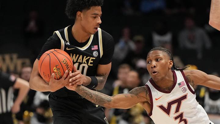 Mar 10, 2026; Charlotte, NC; Wake Forest guard Sebastian Akins (10) with the ball as Virginia Tech guard Ben Hammond (3) defends. Mar 10, 2026; Charlotte, NC; Wake Forest guard Sebastian Akins (10) with the ball as Virginia Tech guard Ben Hammond (3) defends.
