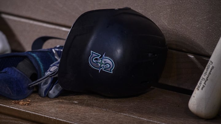 Jun 5, 2022; Arlington, Texas, USA; A view of a Seattle Mariners batting helmet and logo during the game between the Texas Rangers and the Seattle Mariners at Globe Life Field. Mandatory Credit: Jerome Miron-Imagn Images