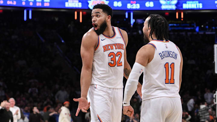 Dec 5, 2024; New York, New York, USA; New York Knicks center Karl-Anthony Towns (32) and New York Knicks guard Jalen Brunson (11) react during the second half against the Charlotte Hornets at Madison Square Garden. Mandatory Credit: John Jones-Imagn Images