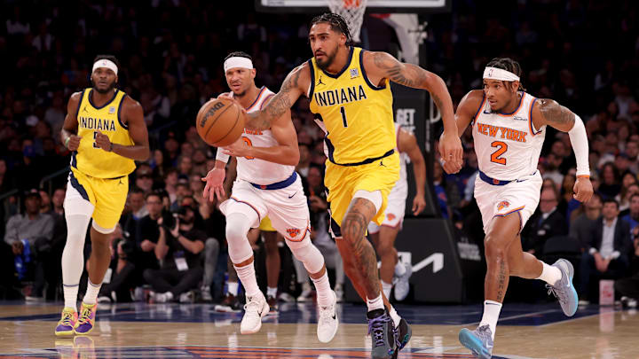 Oct 25, 2024; New York, New York, USA; Indiana Pacers forward Obi Toppin (1) brings the ball up court against New York Knicks guards Josh Hart (3) and Miles McBride (2) during the second quarter at Madison Square Garden. Mandatory Credit: Brad Penner-Imagn Images