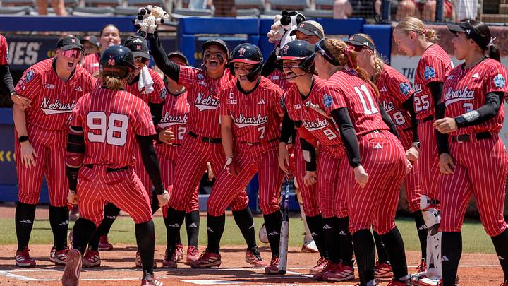 Nebraska celebrates after Nebraska pitcher Jordyn Frahm (98) hits a home run in the first inning during a softball game at the Women’s College World Series between Texas and Nebraska at Devon Park in Oklahoma City, on Sunday, May 31, 2026. Nebraska celebrates after Nebraska pitcher Jordyn Frahm (98) hits a home run in the first inning during a softball game at the Women’s College World Series between Texas and Nebraska at Devon Park in Oklahoma City, on Sunday, May 31, 2026.