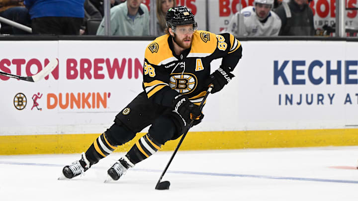 Mar 15, 2025; Boston, Massachusetts, USA; Boston Bruins right wing David Pastrnak (88) skates against the Tampa Bay Lightning during the first period at TD Garden. Mandatory Credit: Eric Canha-Imagn Images
