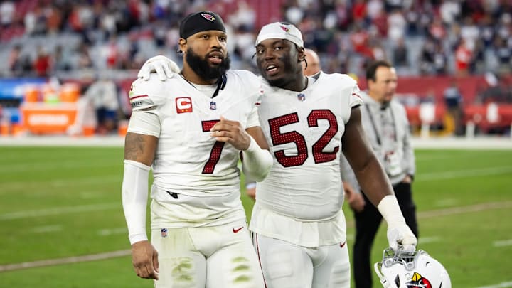 Dec 15, 2024; Glendale, Arizona, USA; Arizona Cardinals linebacker Kyzir White (7) and linebacker Victor Dimukeje (52) against the New England Patriots at State Farm Stadium. Mandatory Credit: Mark J. Rebilas-Imagn Images