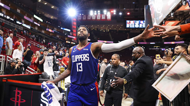 Nov 2, 2022; Houston, Texas, USA; Los Angeles Clippers guard Paul George (13) walks off the court after the game against the Houston Rockets at Toyota Center. Mandatory Credit: Troy Taormina-Imagn Images