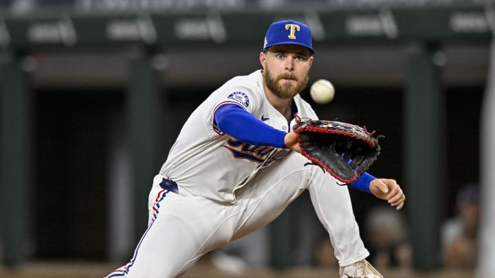 Apr 10, 2024; Arlington, Texas, USA; Texas Rangers first baseman Jared Walsh (21) fields a throw to first base during the fourth inning against the Oakland Athletics at Globe Life Field. Apr 10, 2024; Arlington, Texas, USA; Texas Rangers first baseman Jared Walsh (21) fields a throw to first base during the fourth inning against the Oakland Athletics at Globe Life Field.