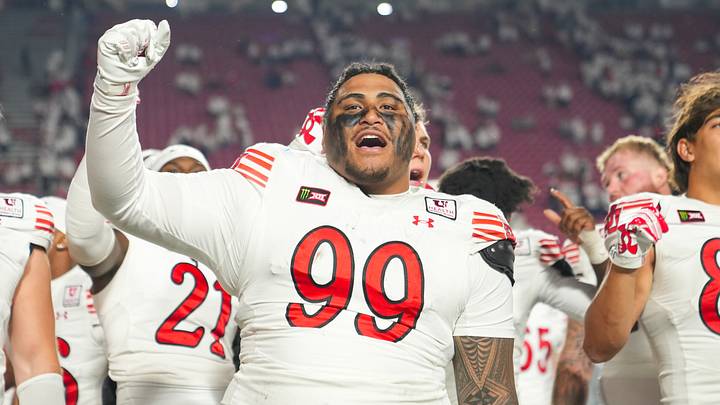 Oct 10, 2026; Salt Lake City, Utah, USA;  Utah Utes tight end Semi Taulanga (99) celebrates after a win over the Kansa Jayhawks at Rice-Eccles Stadium.  Mandatory Credit: Aaron Baker-Imagn Images