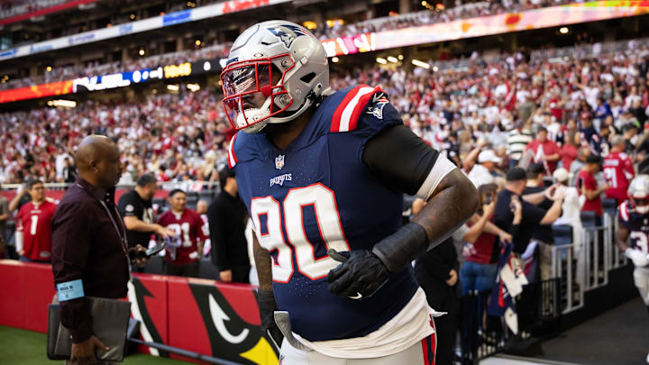 Dec 15, 2024; Glendale, Arizona, USA; New England Patriots defensive tackle Christian Barmore (90) against the Arizona Cardinals at State Farm Stadium. Mandatory Credit: Mark J. Rebilas-Imagn Images