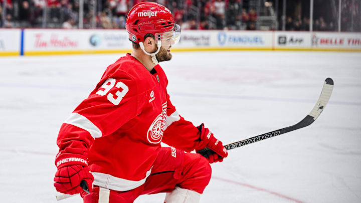 Apr 6, 2025; Detroit, Michigan, USA; Detroit Red Wings right wing Alex DeBrincat (93) celebrates his goal during the second period against the Florida Panthers at Little Caesars Arena. Mandatory Credit: Tim Fuller-Imagn Images