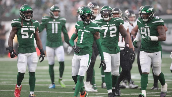 Dec 3, 2023; East Rutherford, NJ; New York Jets cornerback Sauce Gardner (1) celebrates with teammates after a defensive stop during the second half against the Atlanta Falcons at MetLife Stadium.