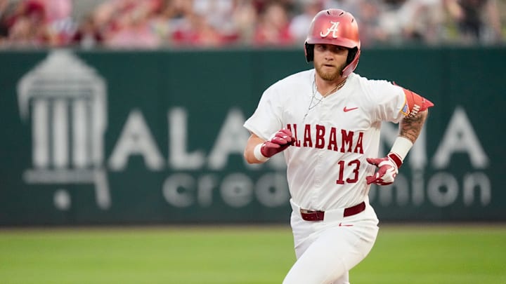 Alabama batter Luke Vaughn jogs the bases after hitting a two-run homer at Sewell-Thomas Stadium against the Auburn Tigers.