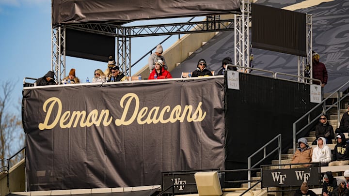 Nov 30, 2024; Winston-Salem, North Carolina, USA; Wake Forest Demon Deacons fans brave the chill during the second half against the Duke Blue Devils at Allegacy Federal Credit Union Stadium. Mandatory Credit: Jim Dedmon-Imagn Images