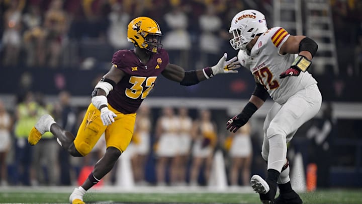 Dec 7, 2024; Arlington, TX, USA; Arizona State Sun Devils defensive lineman Prince Dorbah (32) and Iowa State Cyclones offensive lineman Jalen Travis (72) in action during the game between the Iowa State Cyclones and the Arizona State Sun Devils at AT&T Stadium. Mandatory Credit: Jerome Miron-Imagn Images