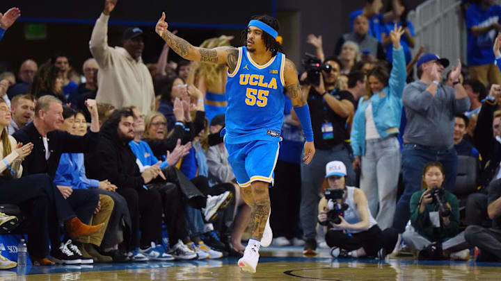 Mar 8, 2025; Los Angeles, California, USA; UCLA Bruins guard Skyy Clark (55) gestures after a three-point basket against the Southern California Trojans in the first half at Pauley Pavilion presented by Wescom. Mandatory Credit: Kirby Lee-Imagn Images