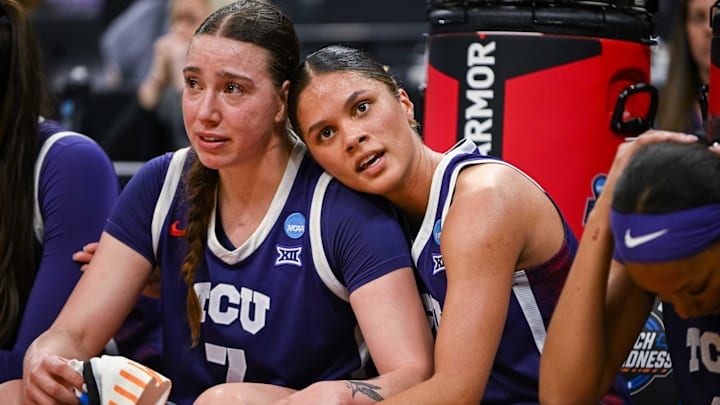 Mar 30, 2026; Sacramento, CA, USA;  Texas Christian University Horned Frogs forward Marta Suarez (7) and guard Donovyn Hunter (4) embrace on the bench during the fourth quarter of the game against the South Carolina Gamecocks in an Elite Eight game in the Sacramento Regional 4 of the women's 2026 NCAA Tournament at the Golden 1 Center. Mandatory Credit: Ed Szczepanski-Imagn Images