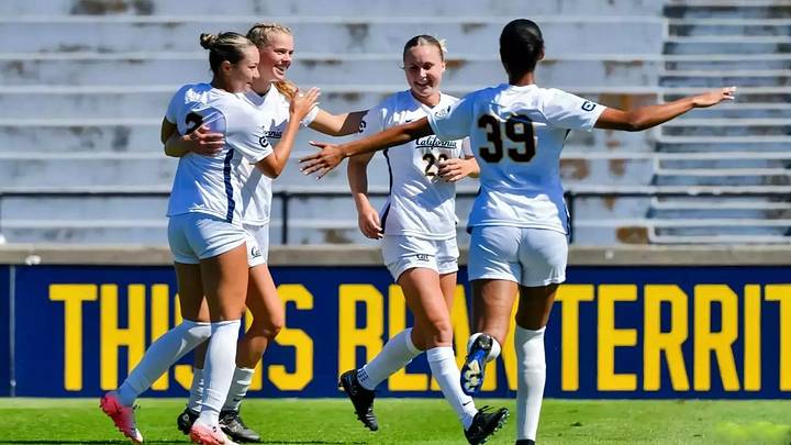 Julia Leontini (22) is greeted by teammates after a goal Julia Leontini (22) is greeted by teammates after a goal