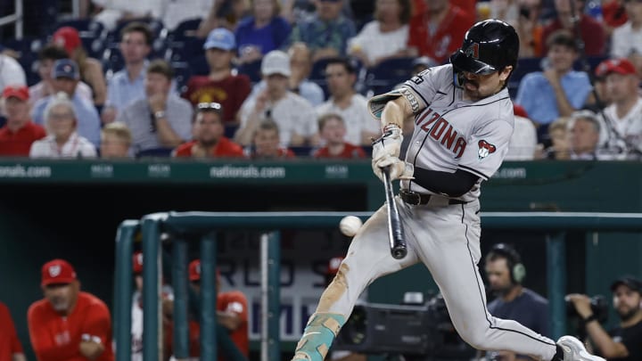 Jun 18, 2024; Washington, District of Columbia, USA; Arizona Diamondbacks outfielder Corbin Carroll (7) singles against the Washington Nationals during the ninth inning at Nationals Park. Mandatory Credit: Geoff Burke-USA TODAY Sports