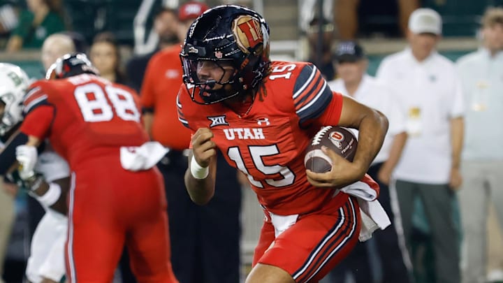 Utah Utes quarterback Byrd Ficklin (15) carries the ball against the Baylor Bears during the second half at McLane Stadium.