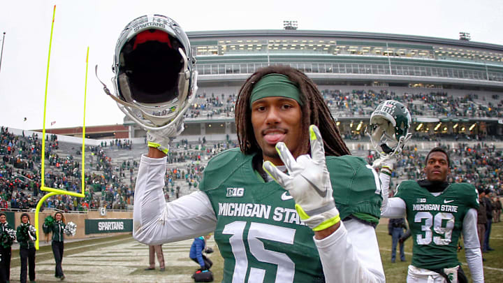 Nov 22, 2014; East Lansing, MI, USA; Michigan State Spartans cornerback Trae Waynes (15) celebrates a win after a game at Spartan Stadium. Mandatory Credit: Mike Carter-Imagn Images Nov 22, 2014; East Lansing, MI, USA; Michigan State Spartans cornerback Trae Waynes (15) celebrates a win after a game at Spartan Stadium. Mandatory Credit: Mike Carter-Imagn Images