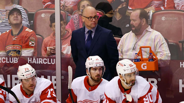 Mar 5, 2022; Sunrise, Florida, USA; Detroit Red Wings head coach Jeff Blashill looks on during the second period against the Florida Panthers at FLA Live Arena. Mandatory Credit: Jim Rassol-Imagn Images