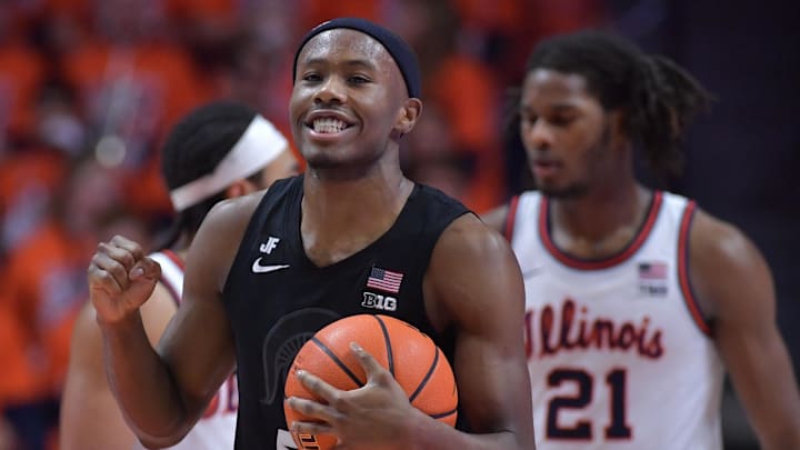 Feb 15, 2025; Champaign, Illinois, USA;  Michigan State Spartans guard Tre Holloman (5) reacts after a win over the Illinois fighting Illini at State Farm Center. Mandatory Credit: Ron Johnson-Imagn Images