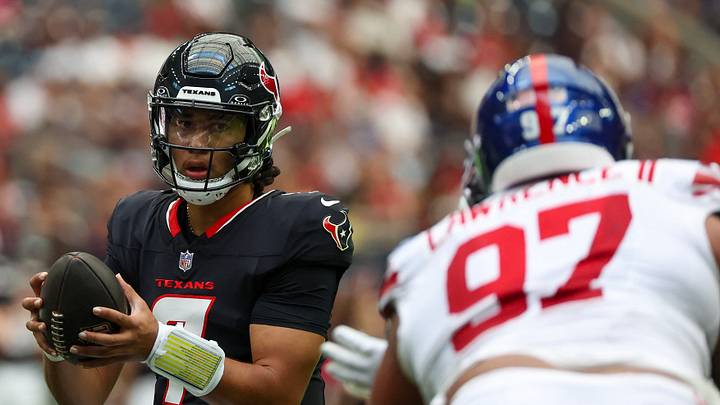 Aug 17, 2024; Houston, Texas, USA; Houston Texans quarterback C.J. Stroud (7) drops back to pass against New York Giants defensive tackle Dexter Lawrence II (97) in the first quarter at NRG Stadium. Mandatory Credit: Thomas Shea-USA TODAY Sports Aug 17, 2024; Houston, Texas, USA; Houston Texans quarterback C.J. Stroud (7) drops back to pass against New York Giants defensive tackle Dexter Lawrence II (97) in the first quarter at NRG Stadium. Mandatory Credit: Thomas Shea-USA TODAY Sports