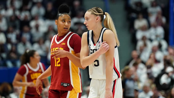 UConn Huskies guard Paige Bueckers (5) and USC Trojans guard JuJu Watkins (12) on the court in the first half at XL Center.
