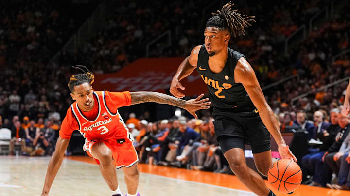 Tennessee guard Chaz Lanier (2) moves past Syracuse guard Lucas Taylor (3) during a college basketball game between Tennessee and Syracuse held at Thompson-Boling Arena at Food City Center in Knoxville, Tenn., on Tuesday, Dec. 3, 2024.