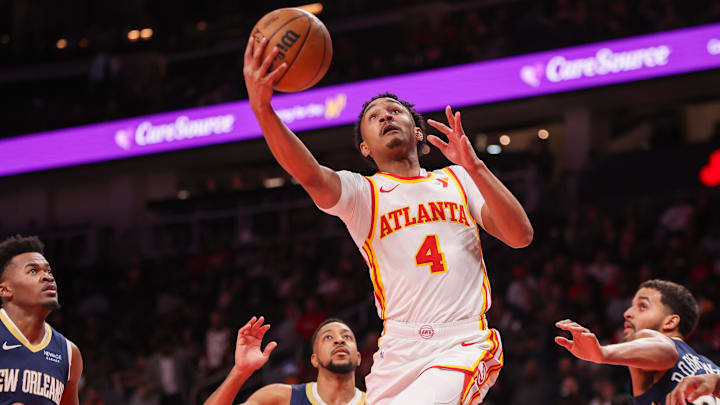 Dec 2, 2024; Atlanta, Georgia, USA; Atlanta Hawks guard Kobe Bufkin (4) shoots against the New Orleans Pelicans in the second quarter at State Farm Arena. Mandatory Credit: Brett Davis-Imagn Images
