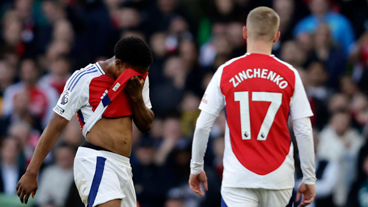 Arsenal's Premier League title chances slimmed further at the weekend