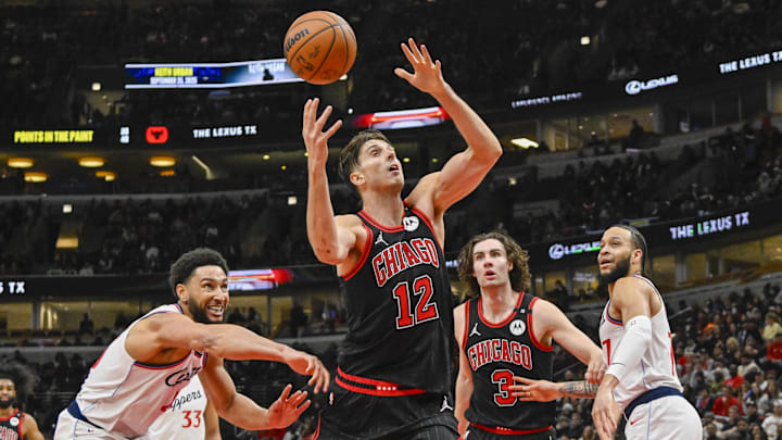 Feb 26, 2025; Chicago, Illinois, USA;  Chicago Bulls forward Zach Collins (12) drives to the basket