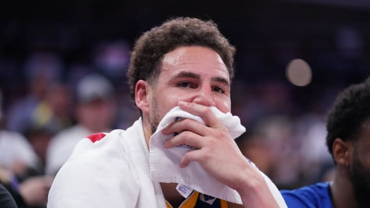 Apr 16, 2024; Sacramento, California, USA; Golden State Warriors guard Klay Thompson (11) sits on the bench during action against the Sacramento Kings in the fourth quarter during a play-in game of the 2024 NBA playoffs at the Golden 1 Center. Mandatory Credit: Cary Edmondson-USA TODAY Sports Apr 16, 2024; Sacramento, California, USA; Golden State Warriors guard Klay Thompson (11) sits on the bench during action against the Sacramento Kings in the fourth quarter during a play-in game of the 2024 NBA playoffs at the Golden 1 Center. Mandatory Credit: Cary Edmondson-USA TODAY Sports