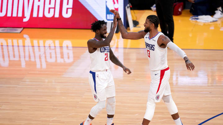 Jan 6, 2021; San Francisco, California, USA; Los Angeles Clippers guard Patrick Beverley (21) and forward Paul George (13) react after the Golden State Warriors were called for a foul in the fourth quarter at the Chase Center. Mandatory Credit: Cary Edmondson-USA TODAY Sports