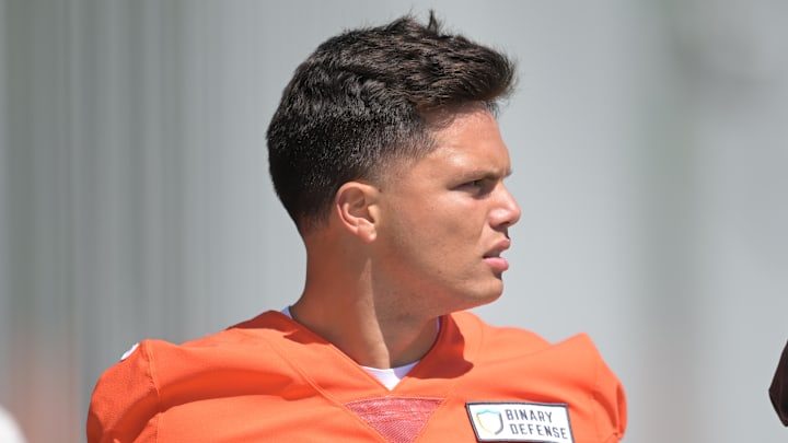 May 9, 2025; Berea, OH, USA; Cleveland Browns quarterback Dillon Gabriel (5) walks off the field after rookie minicamp at CrossCountry Mortgage Campus. May 9, 2025; Berea, OH, USA; Cleveland Browns quarterback Dillon Gabriel (5) walks off the field after rookie minicamp at CrossCountry Mortgage Campus.