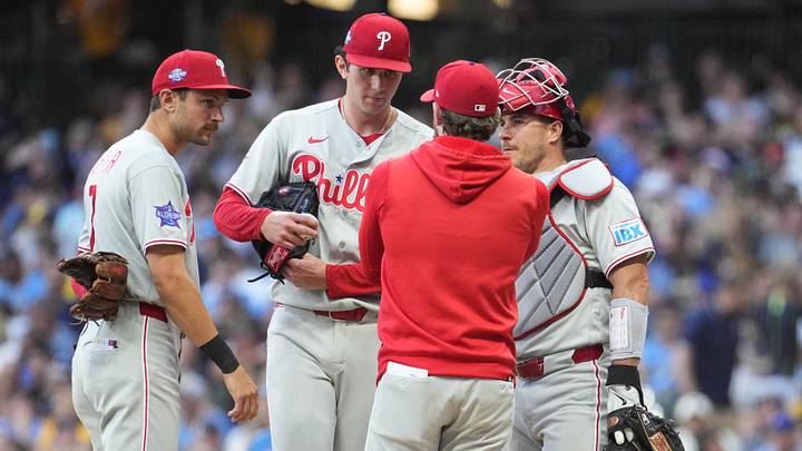 Philadelphia Phillies pitching coach Caleb Cotham has a talk with Philadelphia Phillies pitcher Andrew Painter. Philadelphia Phillies pitching coach Caleb Cotham has a talk with Philadelphia Phillies pitcher Andrew Painter.