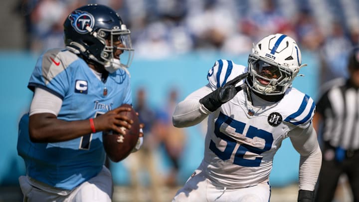 Sep 21, 2025; Nashville, Tennessee, USA;  Indianapolis Colts defensive end Samson Ebukam (52) chases after Tennessee Titans quarterback Cameron Ward (1) during the second half at Nissan Stadium. Mandatory Credit: Steve Roberts-Imagn Images