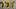 Golden balloons on grey background reading 777