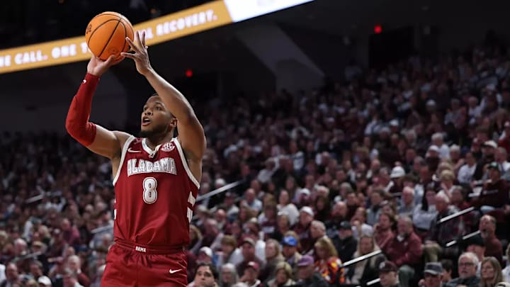 Alabama guard Chris Youngblood (8) shoots a three against Texas A&M at Reed Arena in College Station, TX on Saturday, Jan 11, 2025. Alabama guard Chris Youngblood (8) shoots a three against Texas A&M at Reed Arena in College Station, TX on Saturday, Jan 11, 2025.