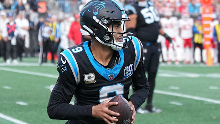 CHARLOTTE, NORTH CAROLINA - NOVEMBER 24: Bryce Young #9 of the Carolina Panthers runs with the ball during the fourth quarter against the Kansas City Chiefs at Bank of America Stadium on November 24, 2024 in Charlotte, North Carolina.