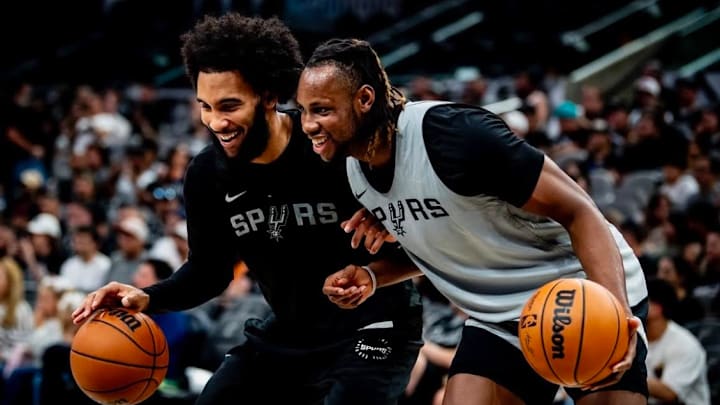 Oct 19, 2024; San Antonio, Texas, USA; San Antonio Spurs forward Julian Champagnie (30) and center Charles Bassey (28) warm up prior to their annual Silver & Black Open Scrimmage at Frost Bank Center. Oct 19, 2024; San Antonio, Texas, USA; San Antonio Spurs forward Julian Champagnie (30) and center Charles Bassey (28) warm up prior to their annual Silver & Black Open Scrimmage at Frost Bank Center.