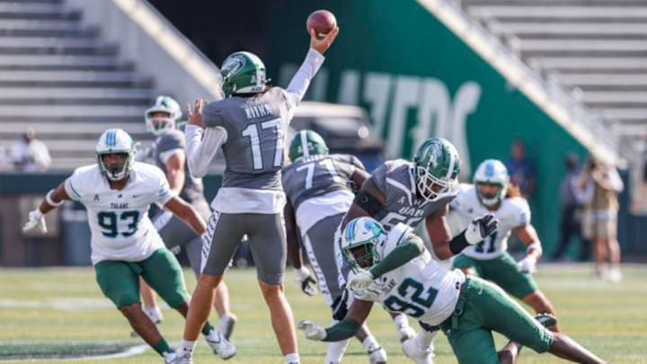 Tulane Green Wave defensive end Gerrod Henderson (92) dives as UAB Blazers quarterback Jalen Kitna (17) throws the ball during the second half of a football game at Protective Stadium in Birmingham, Ala. Saturday, October 5th, 2024. Tulane Green Wave defensive end Gerrod Henderson (92) dives as UAB Blazers quarterback Jalen Kitna (17) throws the ball during the second half of a football game at Protective Stadium in Birmingham, Ala. Saturday, October 5th, 2024.