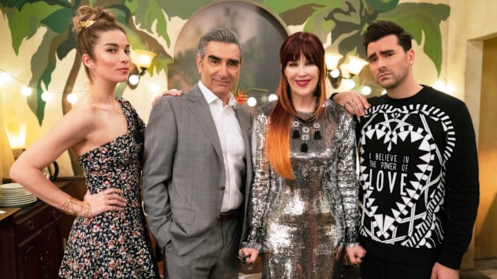 Schitt's Creek -- "Meet the Parents" -- Pictured (L-R): Annie Murphy as Alexis Rose, Eugene Levy as Johnny Rose, Catherine O'Hara as Moira Rose, and Daniel Levy as David Rose -- 