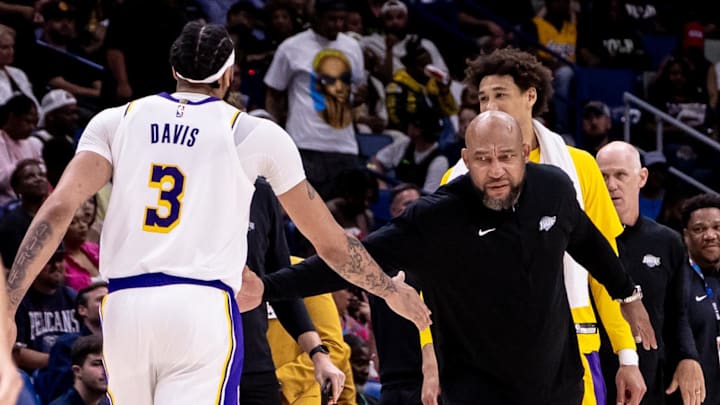 Apr 14, 2024; New Orleans, Louisiana, USA; Los Angeles Lakers head coach Darvin Ham slaps hands with