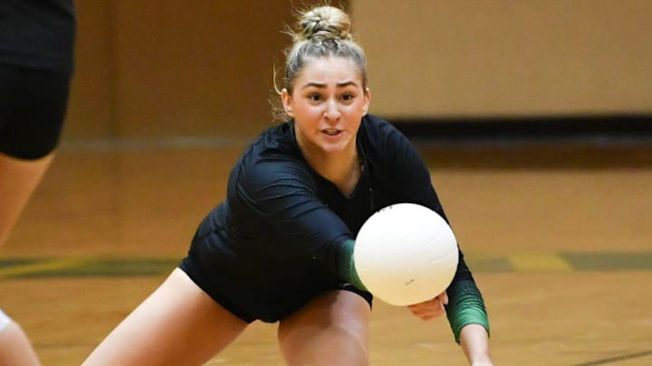Izzy Starck of Viera dives for a ball during the regional semifinal against Lake Minneola in the FHSAA state Class 6A volleyball tournament