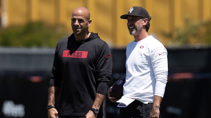 May 9, 2025; Santa Clara, CA, USA; San Francisco 49ers head coach Kyle Shanahan, right, confers with defensive coordinator Robert Saleh during the teamís rookie minicamp. Mandatory Credit: D. Ross Cameron-Imagn Images May 9, 2025; Santa Clara, CA, USA; San Francisco 49ers head coach Kyle Shanahan, right, confers with defensive coordinator Robert Saleh during the teamís rookie minicamp. Mandatory Credit: D. Ross Cameron-Imagn Images
