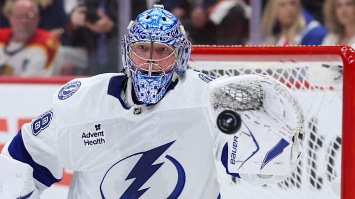 Apr 26, 2025; Sunrise, Florida, USA; Tampa Bay Lightning goaltender Andrei Vasilevskiy (88) makes a save against the Florida Panthers in the first period during game three of the first round of the 2025 Stanley Cup Playoffs at Amerant Bank Arena. Mandatory Credit: Nathan Ray Seebeck-Imagn Images
