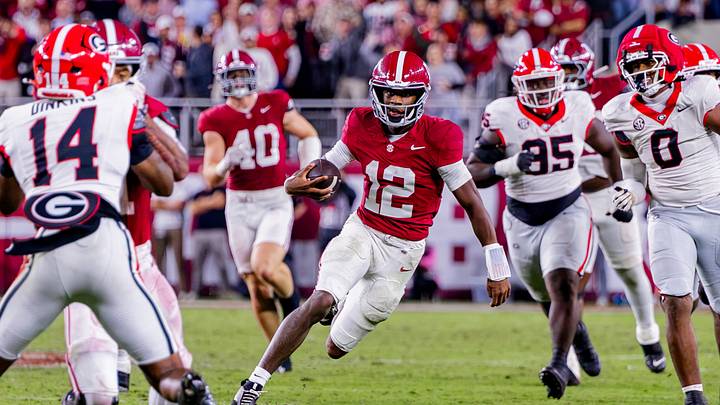 Alabama quarterback Keelon Russell runs through a gap in the second half of the match up against Georgia on Oct 10, 2026. Alabama quarterback Keelon Russell runs through a gap in the second half of the match up against Georgia on Oct 10, 2026.